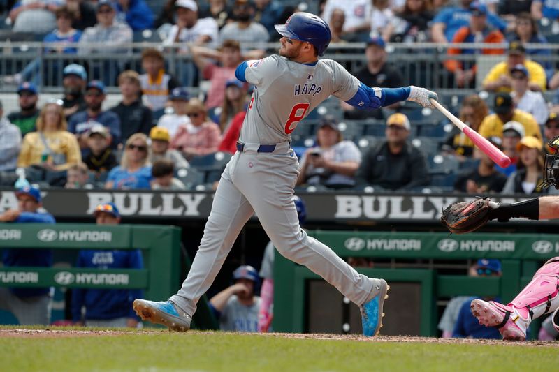 May 12, 2024; Pittsburgh, Pennsylvania, USA;  Chicago Cubs left fielder Ian Happ (8) hits a double against the Pittsburgh Pirates during the ninth inning at PNC Park. Mandatory Credit: Charles LeClaire-USA TODAY Sports