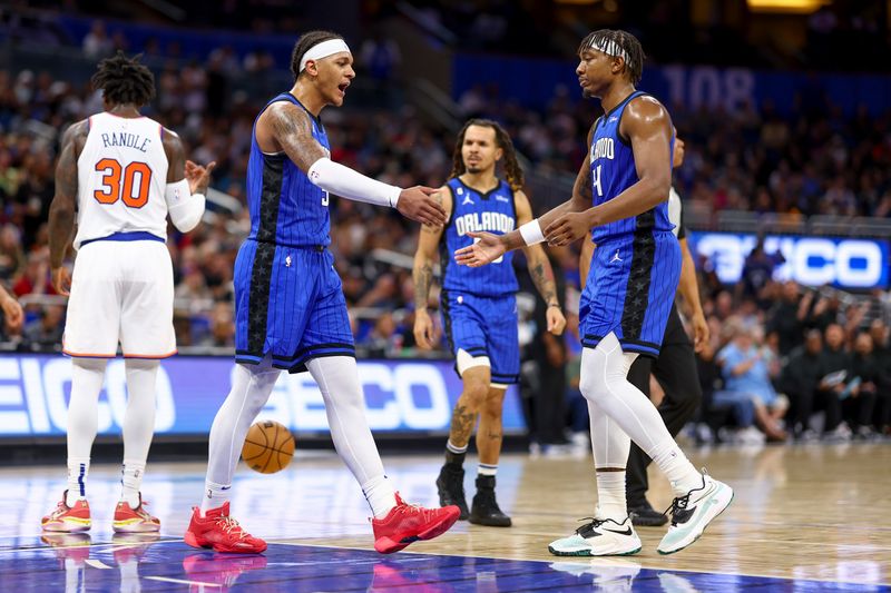 ORLANDO, FLORIDA - MARCH 23: Paolo Banchero #5 and Wendell Carter Jr. #34 of the Orlando Magic react against the New York Knicks during the third quarter at Amway Center on March 23, 2023 in Orlando, Florida. NOTE TO USER: User expressly acknowledges and agrees that, by downloading and or using this photograph, User is consenting to the terms and conditions of the Getty Images License Agreement. (Photo by Douglas P. DeFelice/Getty Images)