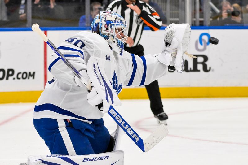 Nov 2, 2024; St. Louis, Missouri, USA;  Toronto Maple Leafs goaltender Joseph Woll (60) defends the net against the St. Louis Blues during the second period at Enterprise Center. Mandatory Credit: Jeff Curry-Imagn Images