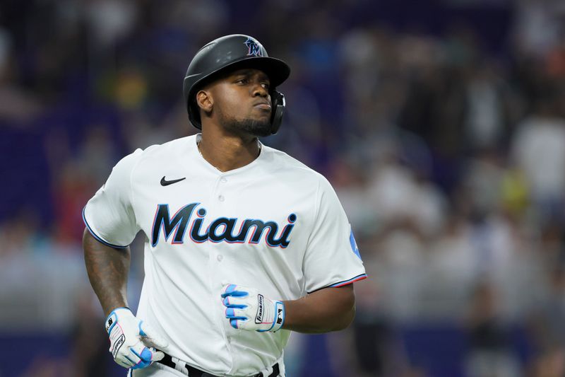 Aug 15, 2023; Miami, Florida, USA; Miami Marlins designated hitter Jorge Soler (12) circles the bases after hitting a two-run home run against the Houston Astros during the third inning at loanDepot Park. Mandatory Credit: Sam Navarro-USA TODAY Sports