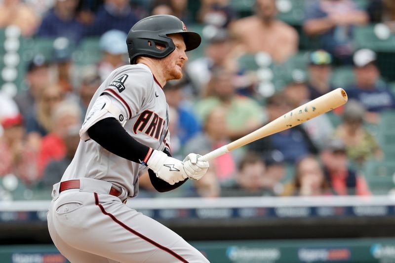 Jun 11, 2023; Detroit, Michigan, USA;  Arizona Diamondbacks designated hitter Pavin Smith (26) hits a single in the seventh inning against the Detroit Tigers at Comerica Park. Mandatory Credit: Rick Osentoski-USA TODAY Sports