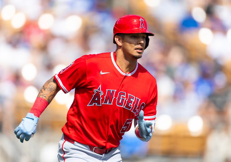 Mar 1, 2026; Phoenix, Arizona, USA; Los Angeles Angels designated hitter Vaughn Grissom rounds the bases after hitting a home run against the Los Angeles Dodgers during a spring training game at Camelback Ranch-Glendale. Mandatory Credit: Mark J. Rebilas-Imagn Images