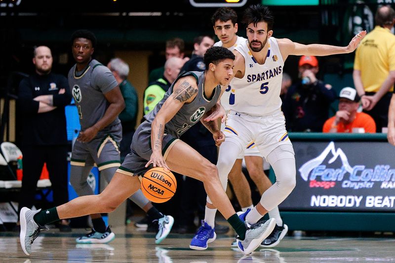 Feb 9, 2024; Fort Collins, Colorado, USA; Colorado State Rams guard Nique Clifford (10) controls the ball as San Jose State Spartans forward Tibet Gorener (5) guards in the first half at Moby Arena. Mandatory Credit: Isaiah J. Downing-USA TODAY Sports