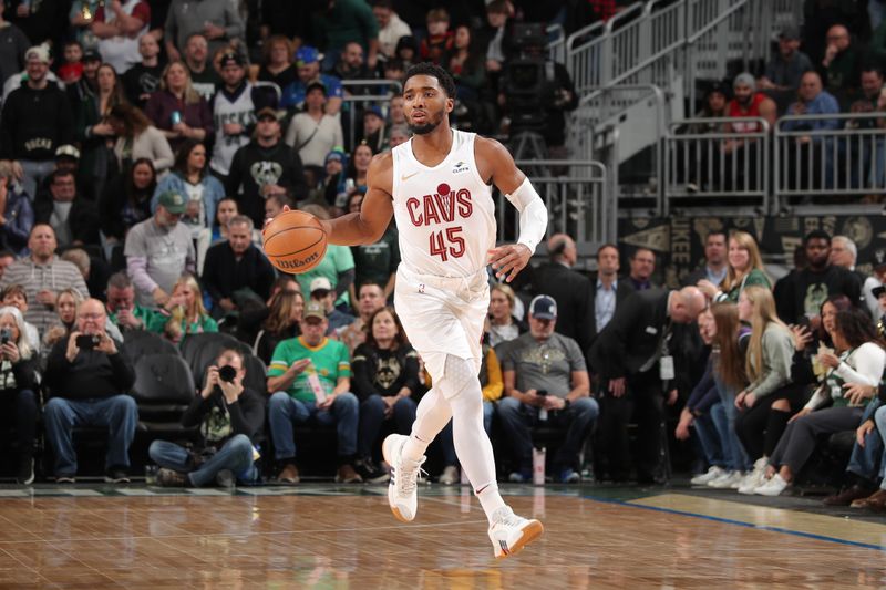 MILWAUKEE, WI - JANUARY 26:  Donovan Mitchell #45 of the Cleveland Cavaliers handles the ball during the game  against the Milwaukee Bucks on January 26, 2024 at the Fiserv Forum Center in Milwaukee, Wisconsin. NOTE TO USER: User expressly acknowledges and agrees that, by downloading and or using this Photograph, user is consenting to the terms and conditions of the Getty Images License Agreement. Mandatory Copyright Notice: Copyright 2024 NBAE (Photo by Gary Dineen/NBAE via Getty Images).