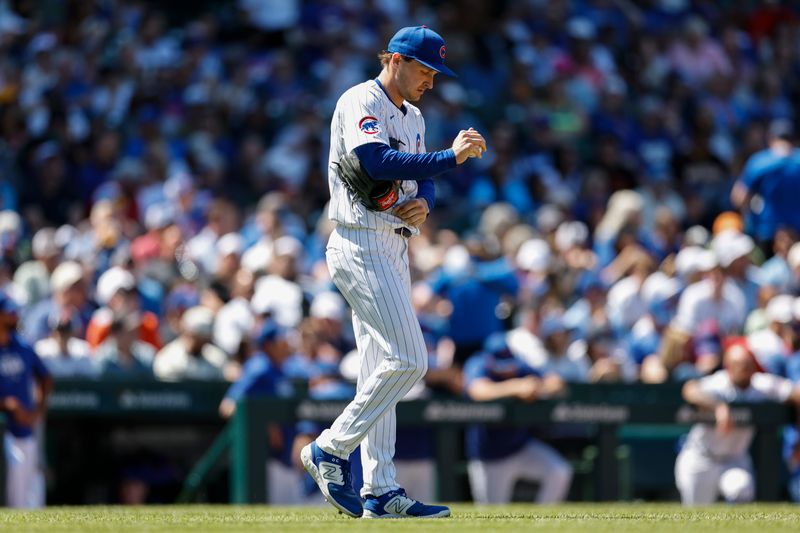 May 8, 2024; Chicago, Illinois, USA; Chicago Cubs starting pitcher Hayden Wesneski (19) reacts during the fifth inning of a baseball game against the San Diego Padres at Wrigley Field. Mandatory Credit: Kamil Krzaczynski-USA TODAY Sports