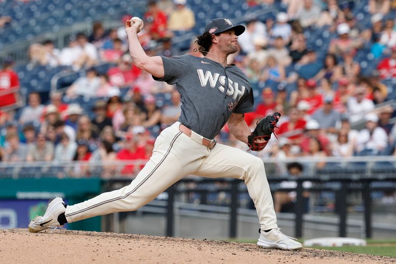 May 25, 2024; Washington, District of Columbia, USA; Washington Nationals relief pitcher Kyle Finnegan (67) pitches against the Seattle Mariners during the ninth inning at Nationals Park. Mandatory Credit: Geoff Burke-USA TODAY Sports