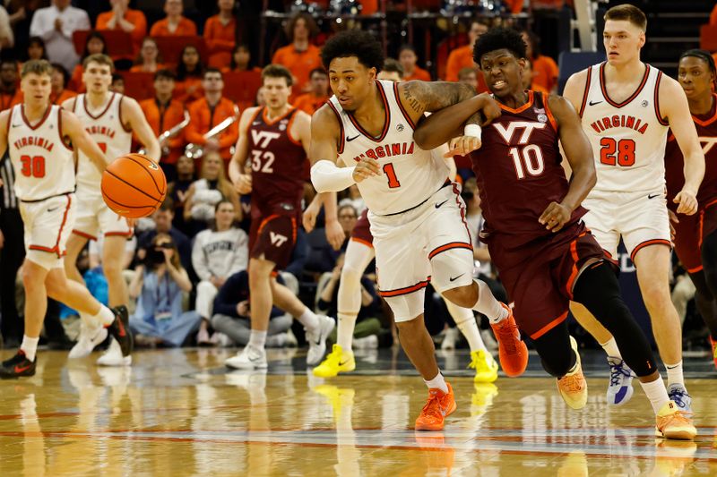 Mar 7, 2026; Charlottesville, Virginia, USA; Virginia Cavaliers guard Malik Thomas (1) and Virginia Tech Hokies guard Tyler Johnson (10) chase a loose ball in the first half at John Paul Jones Arena. Mandatory Credit: Geoff Burke-Imagn Images