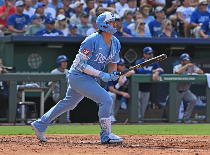 Jun 28, 2025; Kansas City, Missouri, USA;  Kansas City Royals first baseman Vinnie Pasquantino (9) hits a three-run home run in the fifth inning against the Los Angeles Dodgers at Kauffman Stadium. Mandatory Credit: Peter Aiken-Imagn Images