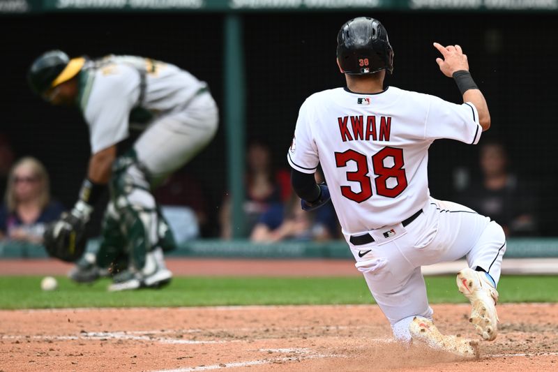 Jun 22, 2023; Cleveland, Ohio, USA; Cleveland Guardians left fielder Steven Kwan (38) scores on a wild pitch as Oakland Athletics catcher Carlos Perez (44) retrieves the ball during the eighth inning at Progressive Field. Mandatory Credit: Ken Blaze-USA TODAY Sports