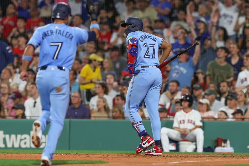 Jun 24, 2024; Boston, Massachusetts, USA; Toronto Blue Jays first baseman Vladimir Guerrero (27) hits a three run home run during the seventh inning against the Boston Red Sox at Fenway Park. Mandatory Credit: Paul Rutherford-USA TODAY Sports