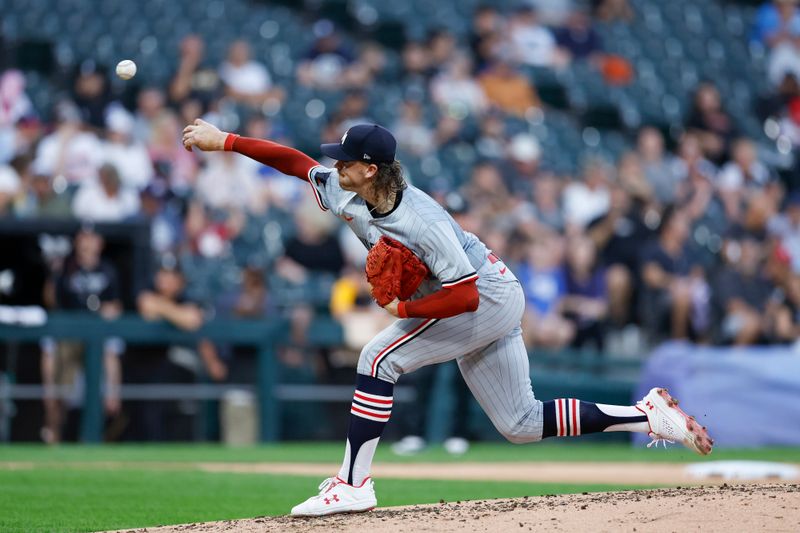 Jul 8, 2024; Chicago, Illinois, USA; Minnesota Twins starting pitcher Chris Paddack (20) delivers a pitch against the Chicago White Sox during the third inning at Guaranteed Rate Field. Mandatory Credit: Kamil Krzaczynski-USA TODAY Sports