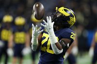 Michigan Wolverines Set to Dominate USC Trojans in a High-Stakes Showdown