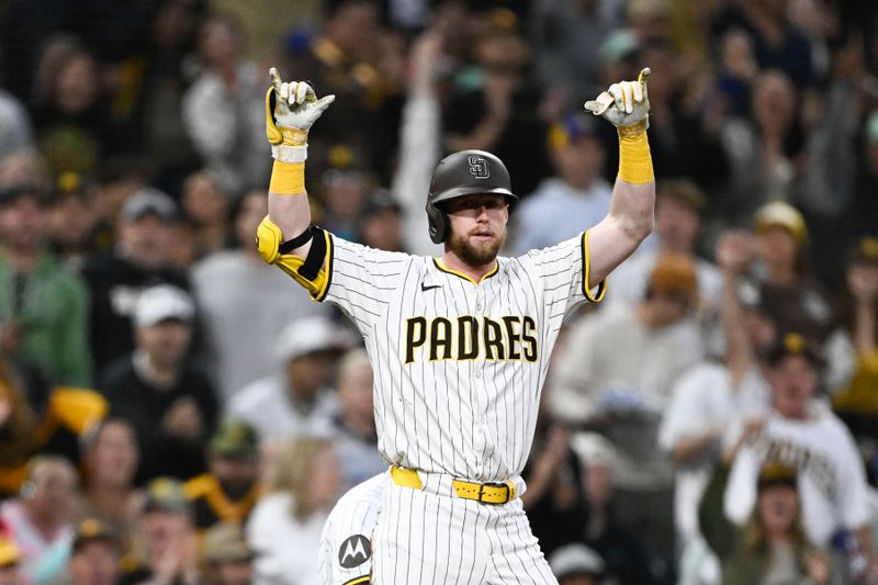 May 16, 2025; San Diego, California, USA; San Diego Padres second baseman Jake Cronenworth (9) celebrates after hitting a triple during the fourth inning against the Seattle Mariners at Petco Park. Mandatory Credit: Denis Poroy-Imagn Images