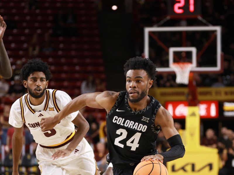 Jan 3, 2026; Tempe, Arizona, USA; Colorado Buffaloes guard Barrington Hargress (24) against Arizona State Sun Devils guard Maurice Odum (5) in the first half at Desert Financial Arena. Mandatory Credit: Mark J. Rebilas-Imagn Images