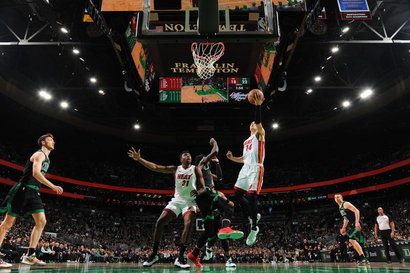 BOSTON, MA - DECEMBER 2: Tyler Herro #14 of the Miami Heat drives to the basket during the game against the Boston Celtics on December 2, 2024 at TD Garden in Boston, Massachusetts. NOTE TO USER: User expressly acknowledges and agrees that, by downloading and/or using this Photograph, user is consenting to the terms and conditions of the Getty Images License Agreement. Mandatory Copyright Notice: Copyright 2024 NBAE (Photo by Brian Babineau/NBAE via Getty Images)