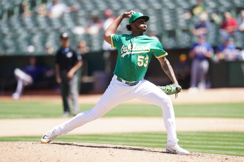 Aug 9, 2023; Oakland, California, USA; Oakland Athletics pitcher Angel Felipe (53) throws against the Texas Rangers in the seventh inning at Oakland-Alameda County Coliseum. Mandatory Credit: Cary Edmondson-USA TODAY Sports