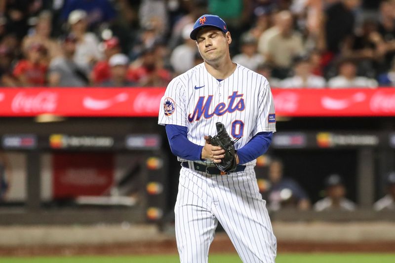 Aug 13, 2023; New York City, New York, USA; New York Mets relief pitcher Adam Ottavino (0) reacts after recording the last out against the Atlanta Braves in a 7-6 victory at Citi Field. Mandatory Credit: Wendell Cruz-USA TODAY Sports