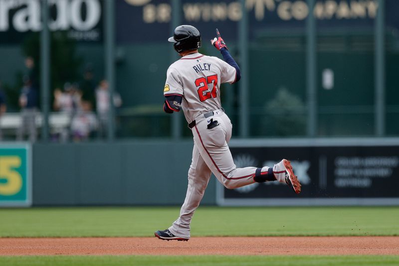 Aug 11, 2024; Denver, Colorado, USA; Atlanta Braves third baseman Austin Riley (27) gestures as he rounds the bases on a solo home run in the first inning against the Colorado Rockies at Coors Field. Mandatory Credit: Isaiah J. Downing-USA TODAY Sports