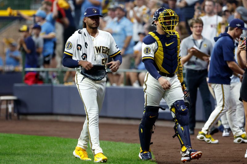 Oct 4, 2023; Milwaukee, Wisconsin, USA; Milwaukee Brewers starting pitcher Freddy Peralta (51) walks on field before game two against the Arizona Diamondbacks in the Wildcard series for the 2023 MLB playoffs at American Family Field. Mandatory Credit: Kamil Krzaczynski-USA TODAY Sports