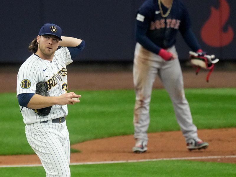 Apr 23, 2023; Milwaukee, Wisconsin, USA; Milwaukee Brewers starting pitcher Corbin Burnes (39) reacts after walking in a run during the second inning of their game against the Boston Red Sox at American Family Field. Mandatory Credit: Mark Hoffman-USA TODAY Sports