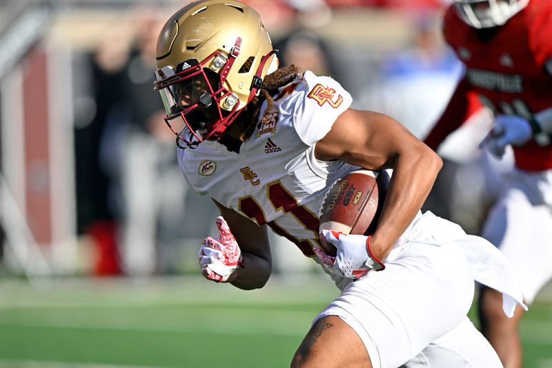 Sep 23, 2023; Louisville, Kentucky, USA; Boston College Eagles wide receiver Lewis Bond (11) runs the ball against the Louisville Cardinals  during the second half at L&N Federal Credit Union Stadium. Louisville defeated Boston College 56-28. Mandatory Credit: Jamie Rhodes-USA TODAY Sports