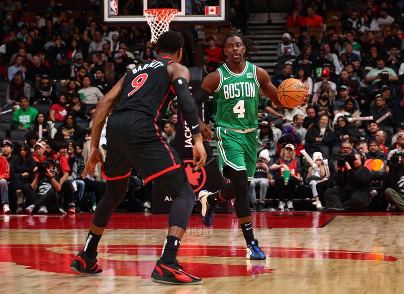 TORONTO, CANADA - JANUARY 15:  Jrue Holiday #4 of the Boston Celtics handles the ball during the game against the Toronto Raptors on January 15, 2024 at the Scotiabank Arena in Toronto, Ontario, Canada.  NOTE TO USER: User expressly acknowledges and agrees that, by downloading and or using this Photograph, user is consenting to the terms and conditions of the Getty Images License Agreement.  Mandatory Copyright Notice: Copyright 2024 NBAE (Photo by Vaughn Ridley/NBAE via Getty Images)