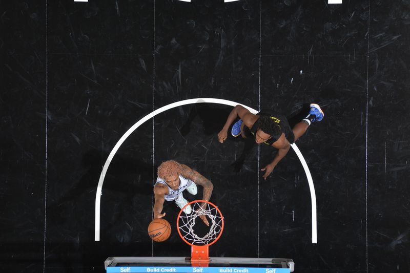 SAN ANTONIO, TX - OCTOBER 12: Jeremy Sochan #10 of the San Antonio Spurs shoots the ball during the game against the Utah Jazz during a NBA pre season game on October 12, 2024 at the Frost Bank Center in San Antonio, Texas. NOTE TO USER: User expressly acknowledges and agrees that, by downloading and or using this photograph, user is consenting to the terms and conditions of the Getty Images License Agreement. Mandatory Copyright Notice: Copyright 2024 NBAE (Photos by Michael Gonzales/NBAE via Getty Images)