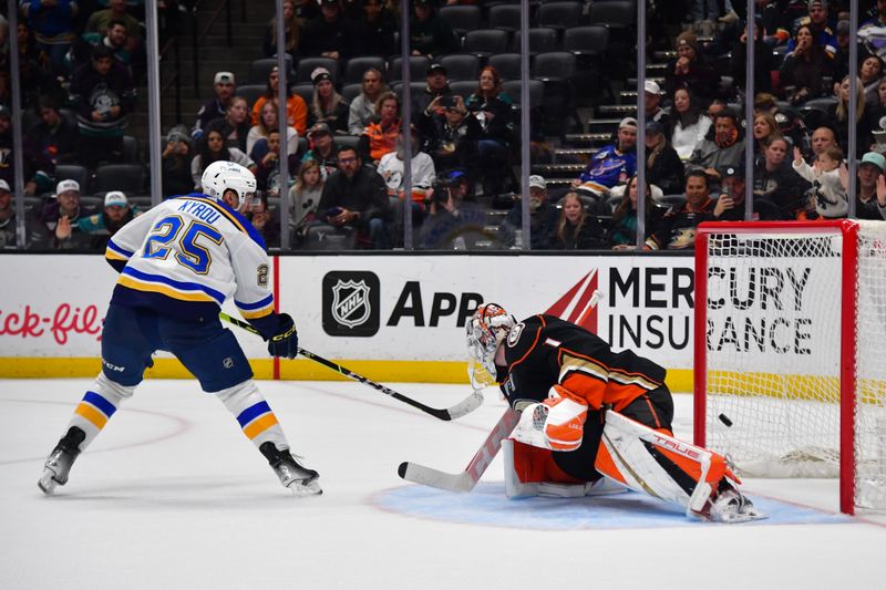 Apr 7, 2024; Anaheim, California, USA; St. Louis Blues center Jordan Kyrou (25) scores a goal against Anaheim Ducks goaltender Lukas Dostal (1) during the shootout at Honda Center. Mandatory Credit: Gary A. Vasquez-USA TODAY Sports