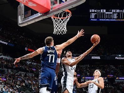 SAN ANTONIO, TX - OCTOBER 25: Devin Vassell #24 of the San Antonio Spurs shoots the ball during the game against the Dallas Mavericks on October 25, 2023 at the Frost Bank Center in San Antonio, Texas. NOTE TO USER: User expressly acknowledges and agrees that, by downloading and or using this photograph, user is consenting to the terms and conditions of the Getty Images License Agreement. Mandatory Copyright Notice: Copyright 2023 NBAE (Photos by Michael Gonzales/NBAE via Getty Images)