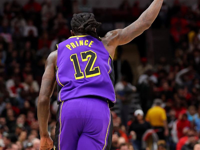 CHICAGO, ILLINOIS - DECEMBER 20: Taurean Prince #12 of the Los Angeles Lakers celebrates a three pointer against the Chicago Bulls during the first half at the United Center on December 20, 2023 in Chicago, Illinois. NOTE TO USER: User expressly acknowledges and agrees that, by downloading and or using this photograph, User is consenting to the terms and conditions of the Getty Images License Agreement.  (Photo by Michael Reaves/Getty Images)