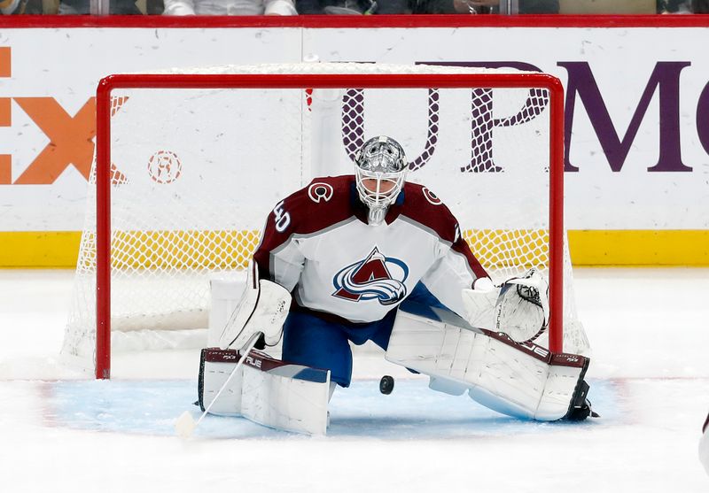 Oct 26, 2023; Pittsburgh, Pennsylvania, USA; Colorado Avalanche goaltender Alexandar Georgiev (40) makes a save against the Pittsburgh Penguins during the second period at PPG Paints Arena. Mandatory Credit: Charles LeClaire-USA TODAY Sports