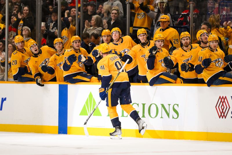 Jan 16, 2025; Nashville, Tennessee, USA;  Nashville Predators center Steven Stamkos (91) celebrates his goal with his teammates against the Chicago Blackhawks during the first period at Bridgestone Arena. Mandatory Credit: Steve Roberts-Imagn Images