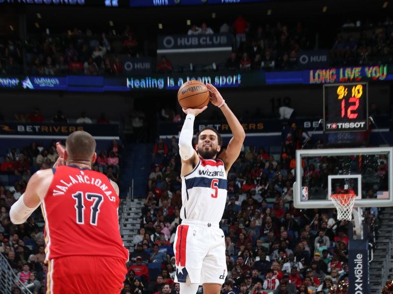 NEW ORLEANS, LA - FEBRUARY 14: Tyus Jones #5 of the Washington Wizards shoots the ball during the game against the New Orleans Pelicans on February 14, 2024 at the Smoothie King Center in New Orleans, Louisiana. NOTE TO USER: User expressly acknowledges and agrees that, by downloading and or using this Photograph, user is consenting to the terms and conditions of the Getty Images License Agreement. Mandatory Copyright Notice: Copyright 2024 NBAE (Photo by Layne Murdoch Jr./NBAE via Getty Images)
