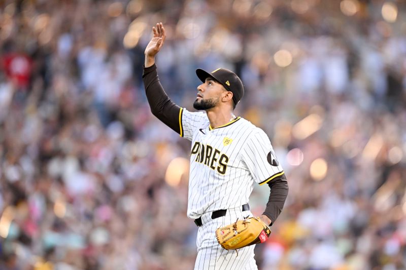 Sep 2, 2024; San Diego, California, USA; San Diego Padres relief pitcher Robert Suarez (75) looks skyward after the Padres defeat the Detroit Tigers at Petco Park. Mandatory Credit: Denis Poroy-USA TODAY Sports