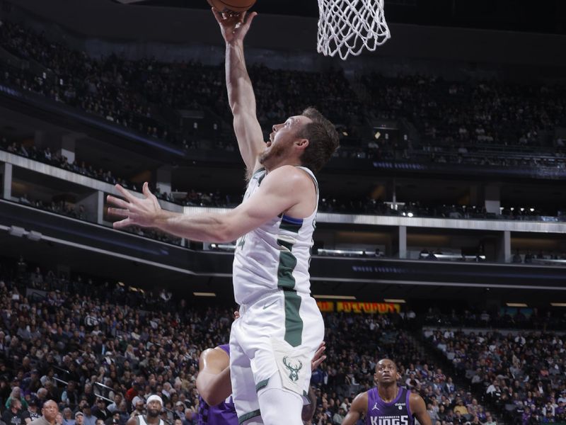 SACRAMENTO, CA - MARCH 12: Pat Connaughton #24 of the Milwaukee Bucks drives to the basket during the game against the Sacramento Kings on March 12, 2024 at Golden 1 Center in Sacramento, California. NOTE TO USER: User expressly acknowledges and agrees that, by downloading and or using this Photograph, user is consenting to the terms and conditions of the Getty Images License Agreement. Mandatory Copyright Notice: Copyright 2024 NBAE (Photo by Rocky Widner/NBAE via Getty Images)