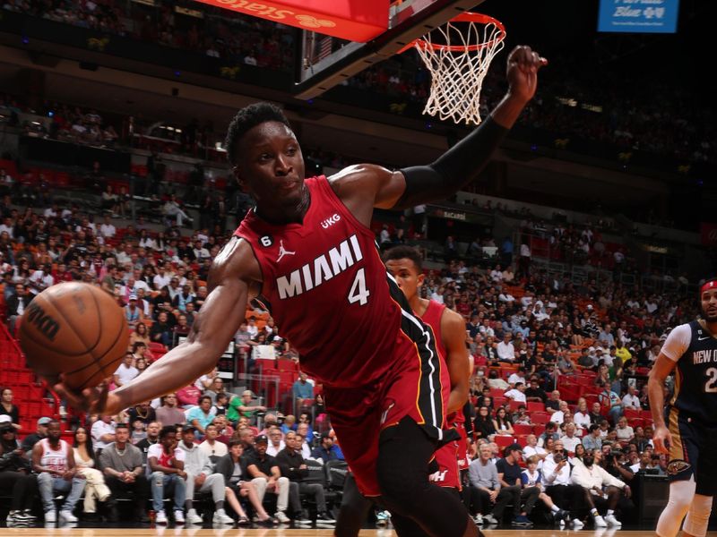 MIAMI, FL - JANUARY 22: Victor Oladipo #4 of the Miami Heat saves the ball from going out of bounds during the game against the New Orleans Pelicans on January 22, 2023 at Miami-Dade Arena in Miami, Florida. NOTE TO USER: User expressly acknowledges and agrees that, by downloading and or using this Photograph, user is consenting to the terms and conditions of the Getty Images License Agreement. Mandatory Copyright Notice: Copyright 2023 NBAE (Photo by Issac Baldizon/NBAE via Getty Images).