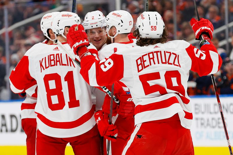 Feb 15, 2023; Edmonton, Alberta, CAN; The Detroit Red Wings celebrate a goal scored by defensemen Olli Maatta (2) during the second period against the Edmonton Oilers at Rogers Place. Mandatory Credit: Perry Nelson-USA TODAY Sports