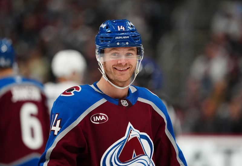 Apr 8, 2025; Denver, Colorado, USA; Colorado Avalanche right wing Chris Wagner (14) reacts in the first period against the Vegas Golden Knights at Ball Arena. Mandatory Credit: Ron Chenoy-Imagn Images