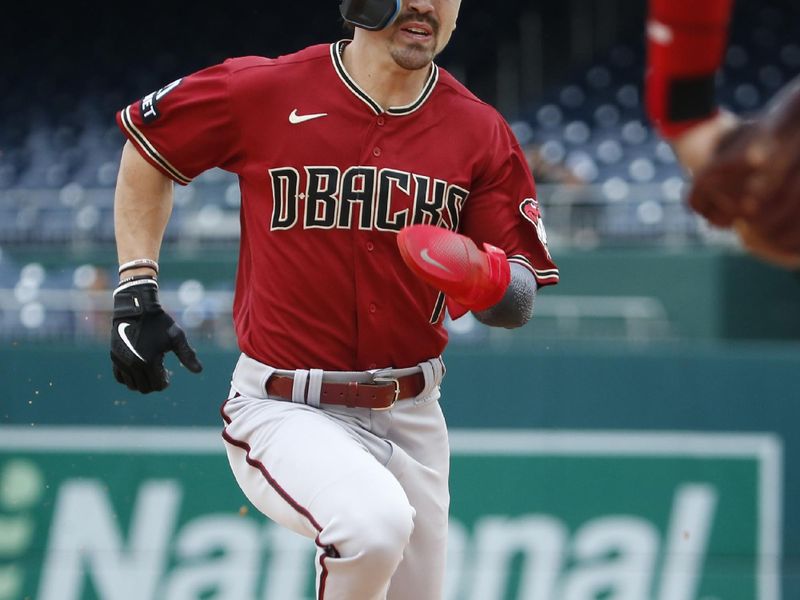 Jun 22, 2023; Washington, District of Columbia, USA; Arizona Diamondbacks left fielder Corbin Carroll (7) rounds third base to score a run during the first inning against the Washington Nationals at Nationals Park. Mandatory Credit: Amber Searls-USA TODAY Sports