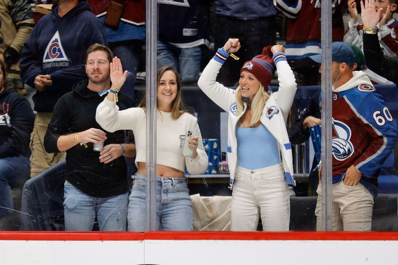 Mar 22, 2024; Denver, Colorado, USA; Colorado Avalanche fans celebrate after a goal in the second period against the Columbus Blue Jackets at Ball Arena. Mandatory Credit: Isaiah J. Downing-USA TODAY Sports