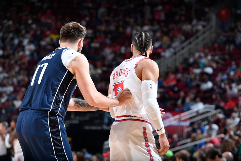 HOUSTON, TX - MARCH 31: Luka Doncic #77 of the Dallas Mavericks and Dillon Brooks #9 of the Houston Rockets look on during the game on March 31, 2024 at the Toyota Center in Houston, Texas. NOTE TO USER: User expressly acknowledges and agrees that, by downloading and or using this photograph, User is consenting to the terms and conditions of the Getty Images License Agreement. Mandatory Copyright Notice: Copyright 2024 NBAE (Photo by Logan Riely/NBAE via Getty Images)