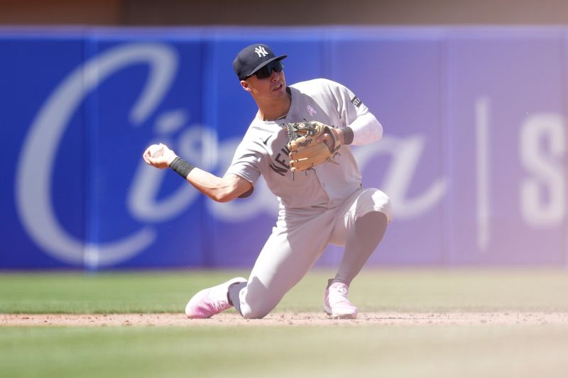 May 11, 2025; West Sacramento, California, USA; New York Yankees shortstop Anthony Volpe (11) throws the ball to second base to record an out against the Athletics in the seventh inning at Sutter Health Park. Mandatory Credit: Cary Edmondson-Imagn Images