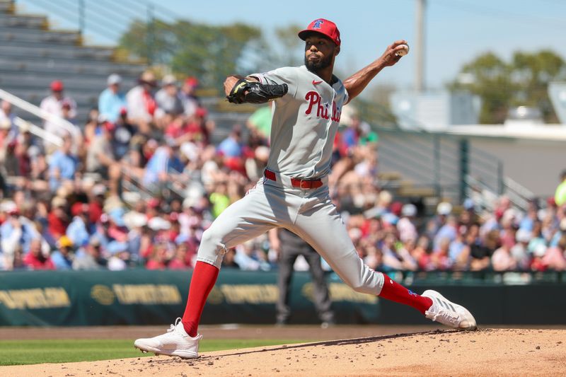 Mar 7, 2025; Bradenton, Florida, USA; Philadelphia Phillies pitcher Cristopher Sanchez (61) throws a pitch against the Pittsburgh Pirates in the first inning during spring training at LECOM Park. Mandatory Credit: Nathan Ray Seebeck-Imagn Images