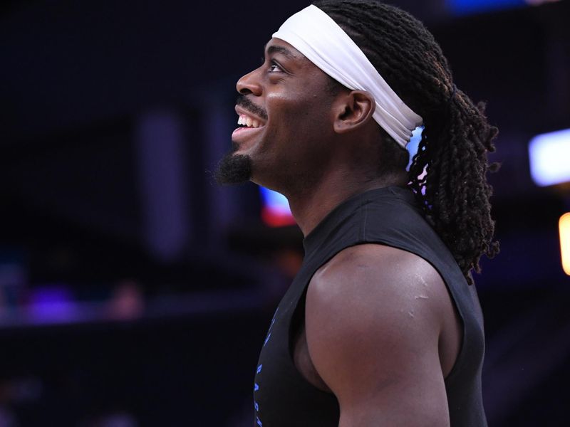 SAN FRANCISCO, CA - NOVEMBER 27: Luguentz Dort #5 of the Oklahoma City Thunder smiles before the game against the Golden State Warriors on November 27, 2024 at Chase Center in San Francisco, California. NOTE TO USER: User expressly acknowledges and agrees that, by downloading and or using this photograph, user is consenting to the terms and conditions of Getty Images License Agreement. Mandatory Copyright Notice: Copyright 2024 NBAE (Photo by Noah Graham/NBAE via Getty Images)