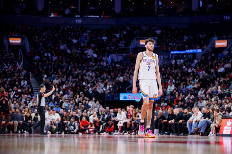 TORONTO, CANADA - MARCH 22: Chet Holmgren #7 of the Oklahoma City Thunder walks the floor during a break in play against the Toronto Raptors in the second half of their NBA game at Scotiabank Arena on March 22, 2024 in Toronto, Canada. NOTE TO USER: User expressly acknowledges and agrees that, by downloading and or using this photograph, User is consenting to the terms and conditions of the Getty Images License Agreement. (Photo by Cole Burston/Getty Images)