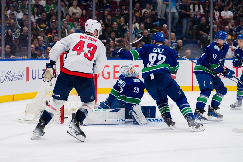 Mar 16, 2024; Vancouver, British Columbia, CAN; Vancouver Canucks defenseman Filip Hronek (17) and defenseman Ian Cole (82) and goalie Casey DeSmith (29) react after forward Tom Wilson (43) scored on DeSmith in the second period at Rogers Arena. Mandatory Credit: Bob Frid-USA TODAY Sports