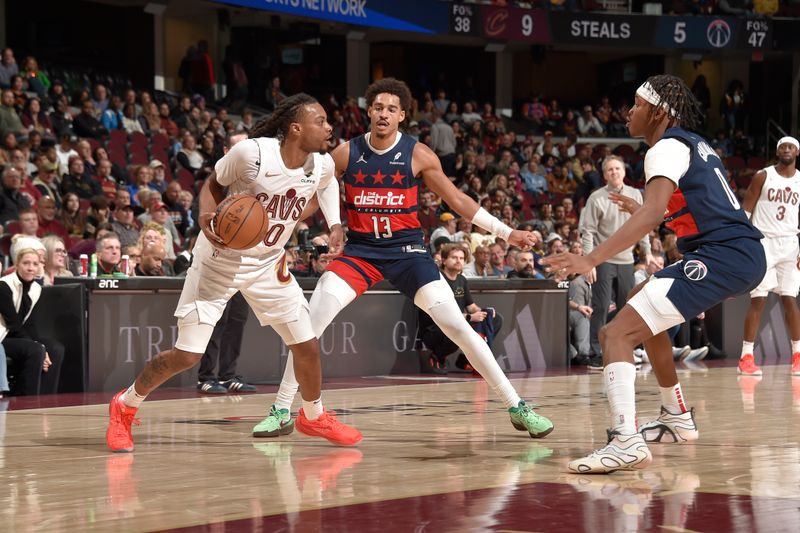 CLEVELAND, OH - DECEMBER 13: Darius Garland #10 of the Cleveland Cavaliers handles the ball during the game against the Washington Wizards on December 13, 2024 at Rocket Mortgage FieldHouse in Cleveland, Ohio. NOTE TO USER: User expressly acknowledges and agrees that, by downloading and/or using this Photograph, user is consenting to the terms and conditions of the Getty Images License Agreement. Mandatory Copyright Notice: Copyright 2024 NBAE (Photo by David Liam Kyle/NBAE via Getty Images)