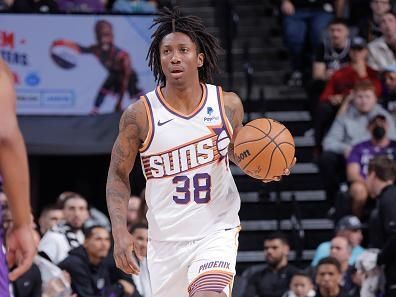 SACRAMENTO, CA - DECEMBER 22:  Saben Lee #38 of the Phoenix Suns handles the ball during the game  on December 22, 2023 at Golden 1 Center in Sacramento, California. NOTE TO USER: User expressly acknowledges and agrees that, by downloading and or using this Photograph, user is consenting to the terms and conditions of the Getty Images License Agreement. Mandatory Copyright Notice: Copyright 2023 NBAE (Photo by Rocky Widner/NBAE via Getty Images)