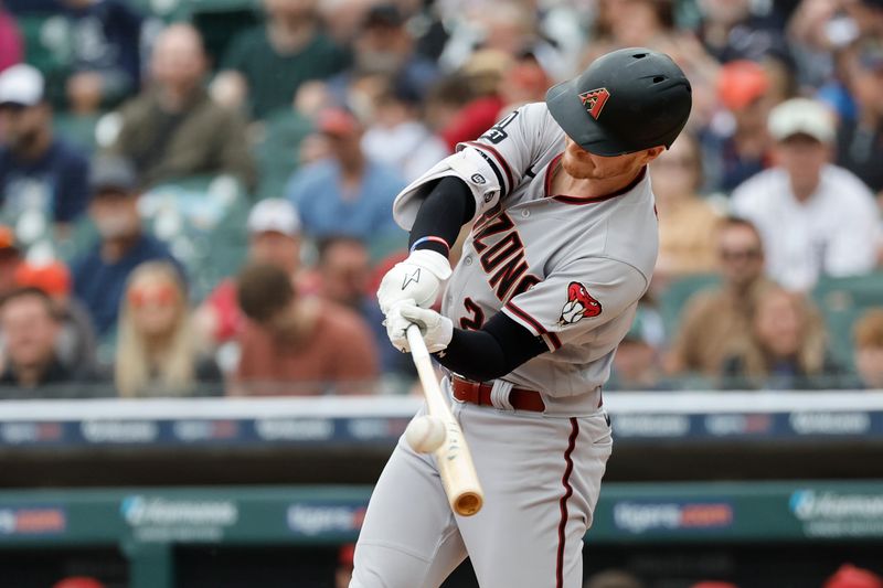 Jun 11, 2023; Detroit, Michigan, USA; Arizona Diamondbacks designated hitter Pavin Smith (26) hits a two run home run in the second inning against the Detroit Tigers at Comerica Park. Mandatory Credit: Rick Osentoski-USA TODAY Sports