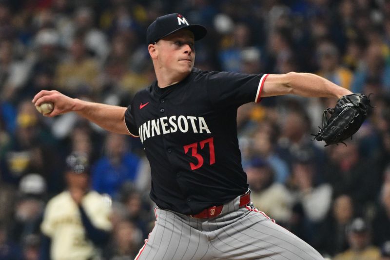 Apr 2, 2024; Milwaukee, Wisconsin, USA;  Minnesota Twins pitcher Louie Varland (37) throws a pitch in the first inning against the Milwaukee Brewers at American Family Field. Mandatory Credit: Benny Sieu-USA TODAY Sports